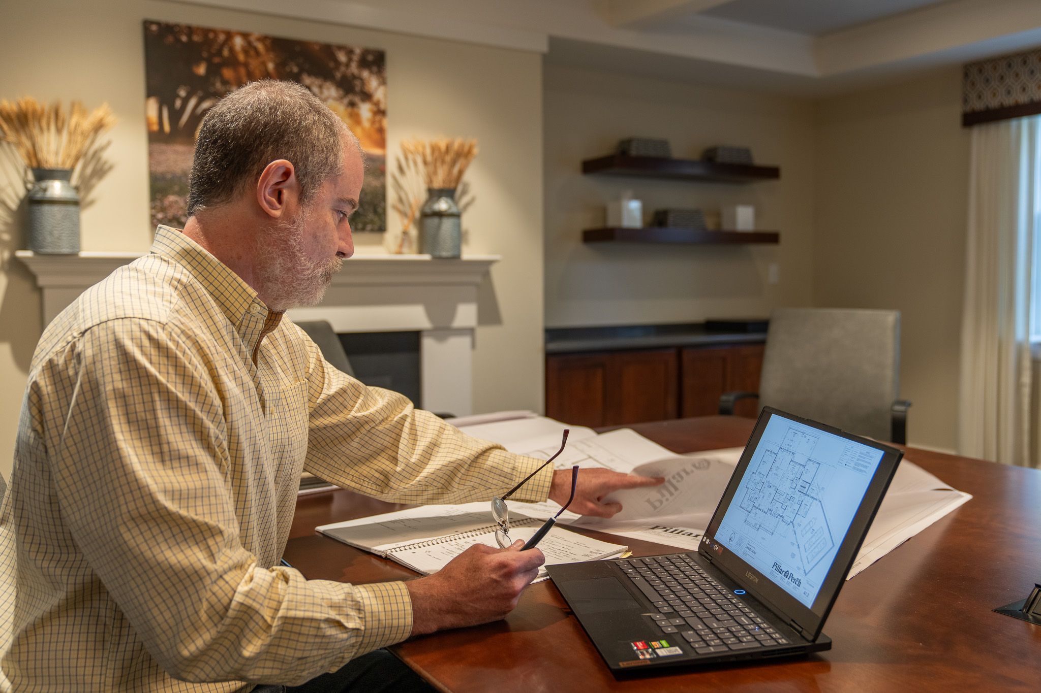 Architect studying plans